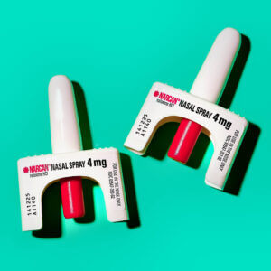 narcan devices on teal background